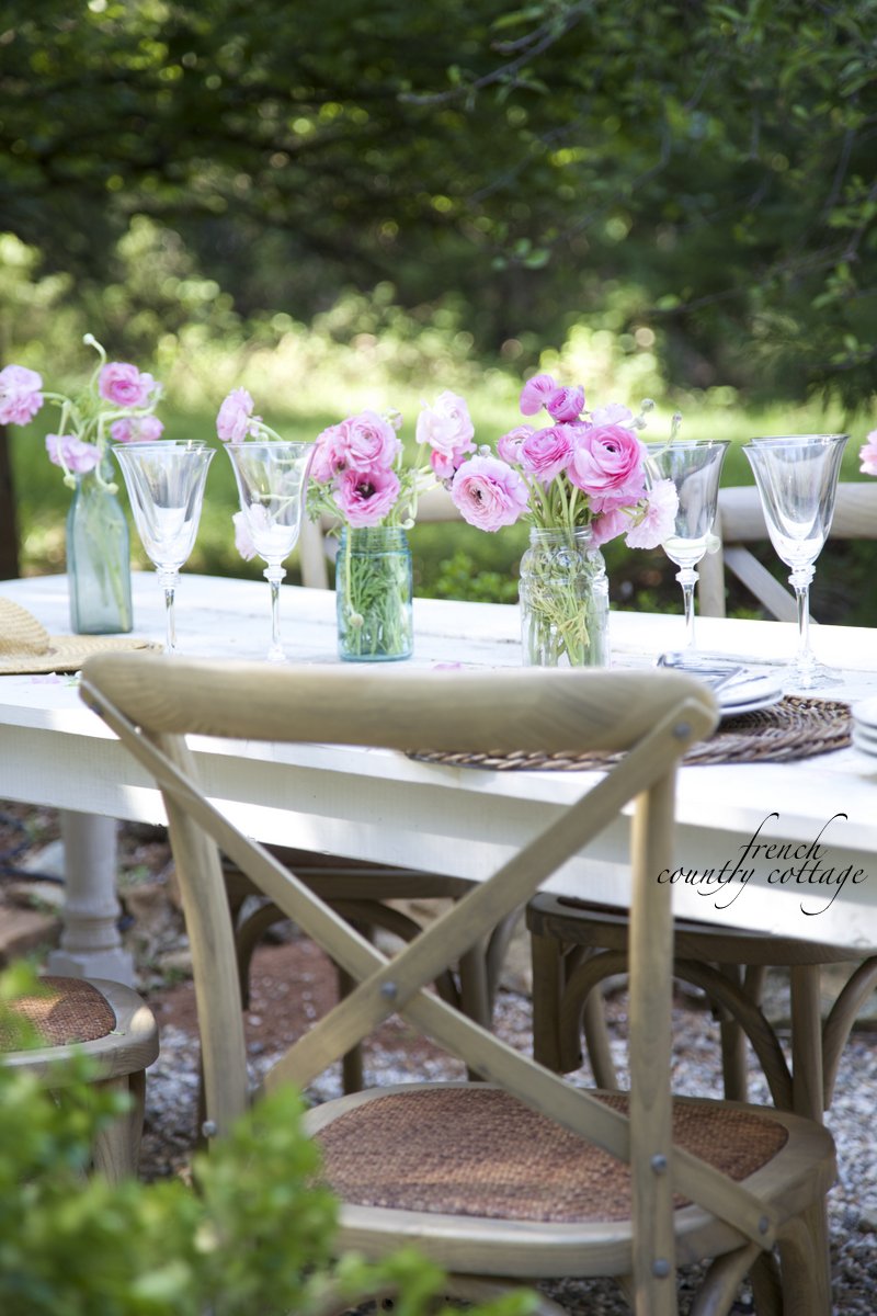 Dining outdoors on the patio French Country Cottage