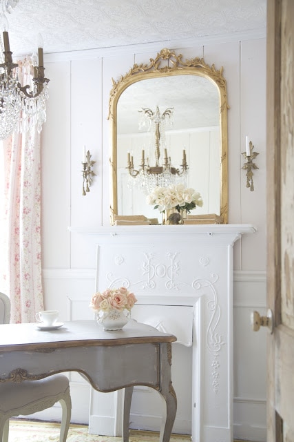french style office with blush walls and gray desk