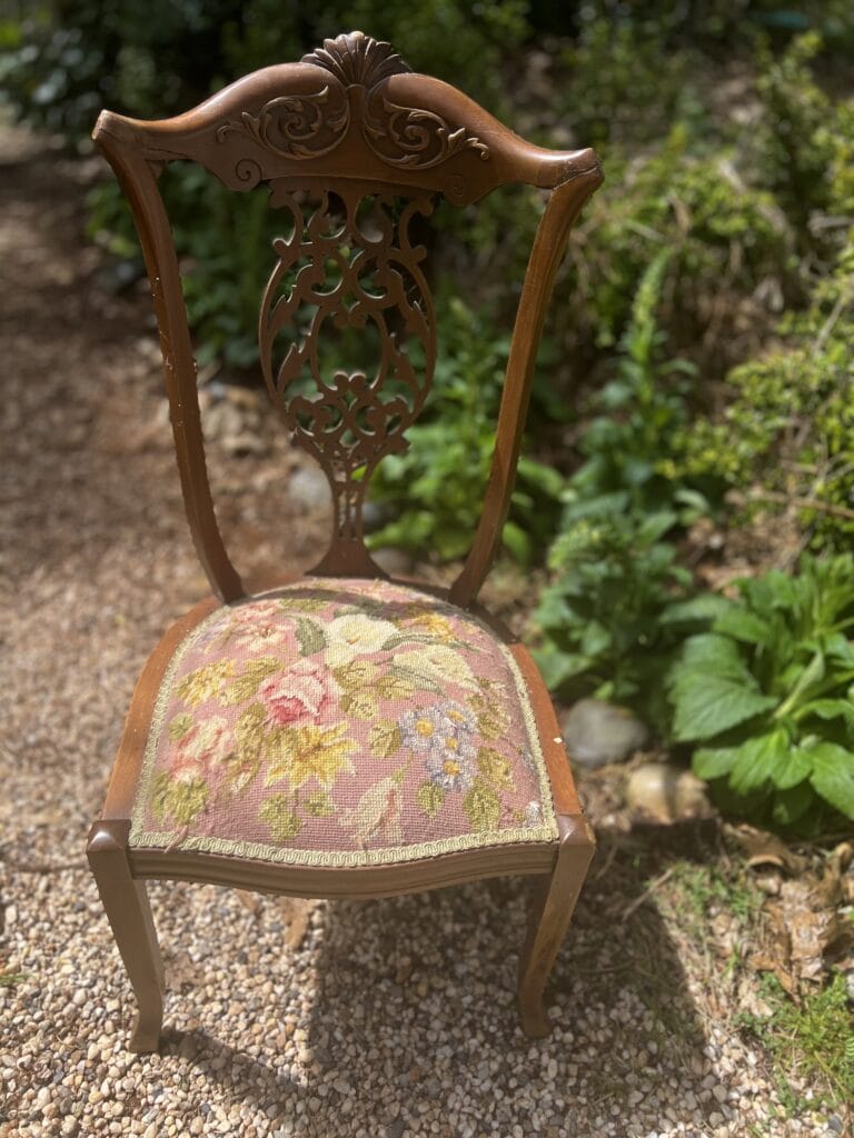 needlepoint seat on antique chair 